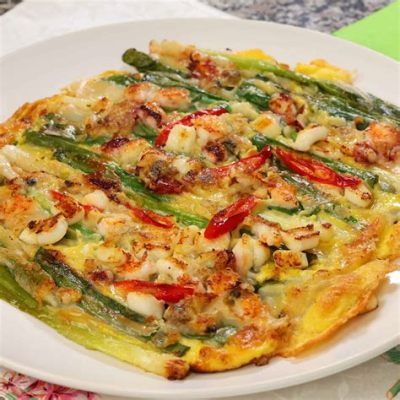   Haemul Pajeon!  A Crispy Delight Where Savory Seafood Dances with Aromatic Green Onion Pancakes